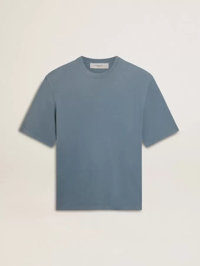 T-shirt unisex in cotone azzurro con stampa rovesciata sul retro T-shirt unisex in cotone azzurro con stampa rovesciata sul retro