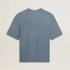 T-shirt unisex in cotone azzurro con stampa rovesciata sul retro T-shirt unisex in cotone azzurro con stampa rovesciata sul retro