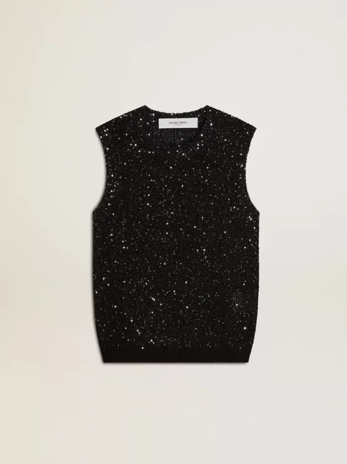 Top in maglia nera con paillettes e dettagli a contrasto