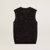 Top in maglia nera con paillettes e dettagli a contrasto