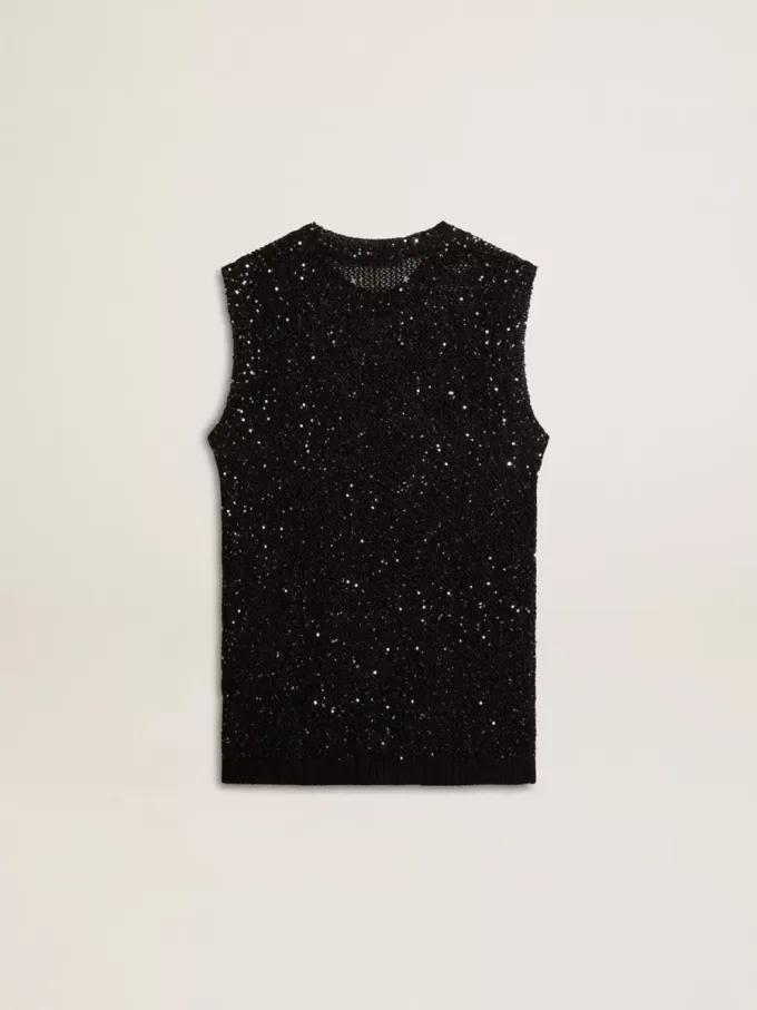 Top in maglia nera con paillettes e dettagli a contrasto