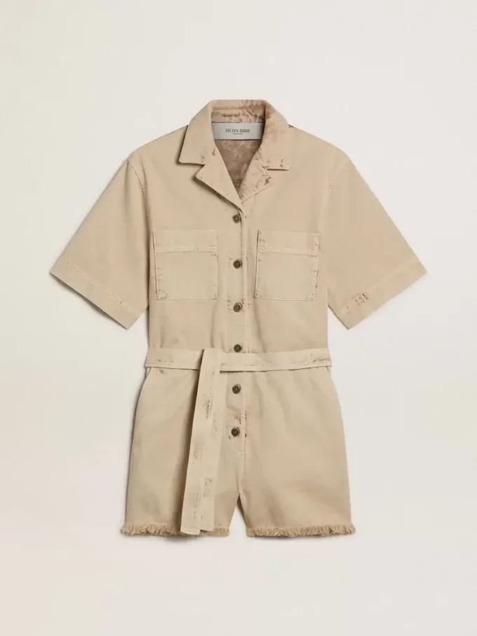 Tuta da donna in denim beige con cintura e orlo sfrangiato