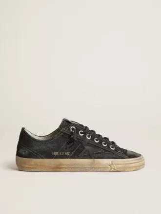 V-Star in denim blu notte con stella e puntale in pelle nera