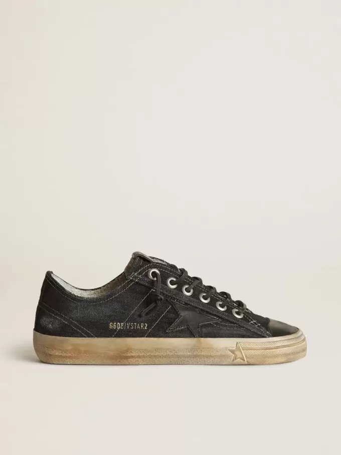V-Star in denim blu notte con stella e puntale in pelle nera