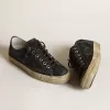 V-Star in denim blu notte con stella e puntale in pelle nera