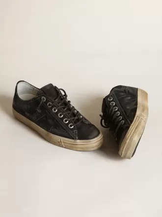 V-Star in denim blu notte con stella e puntale in pelle nera