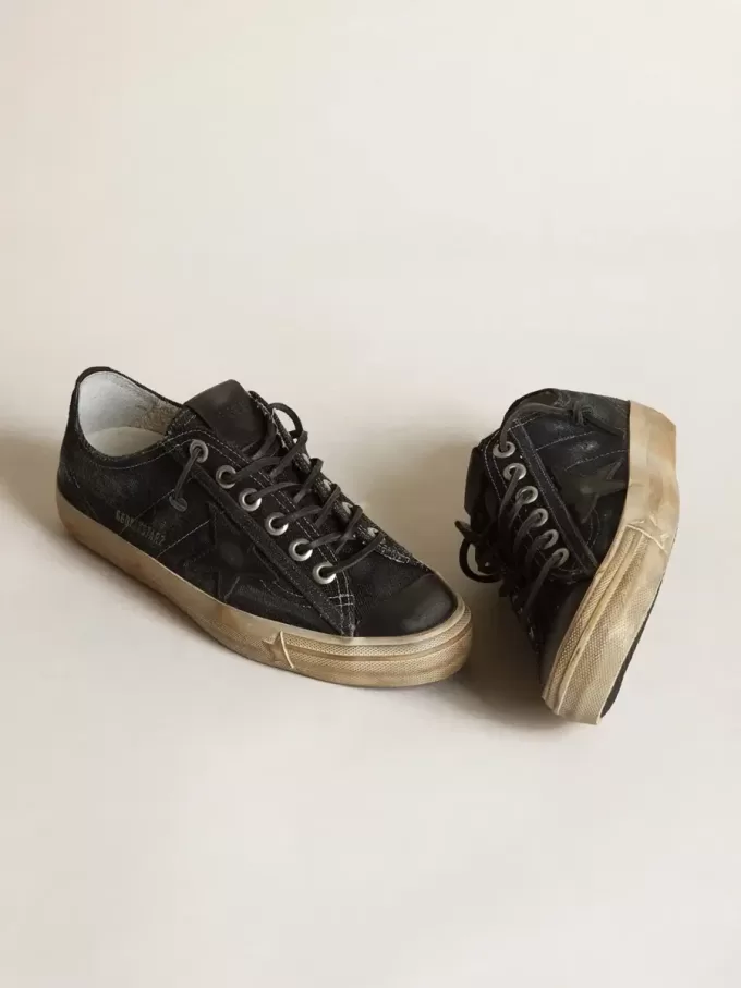 V-Star in denim blu notte con stella e puntale in pelle nera