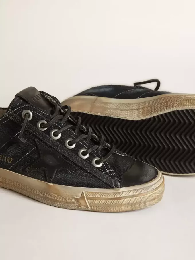V-Star in denim blu notte con stella e puntale in pelle nera