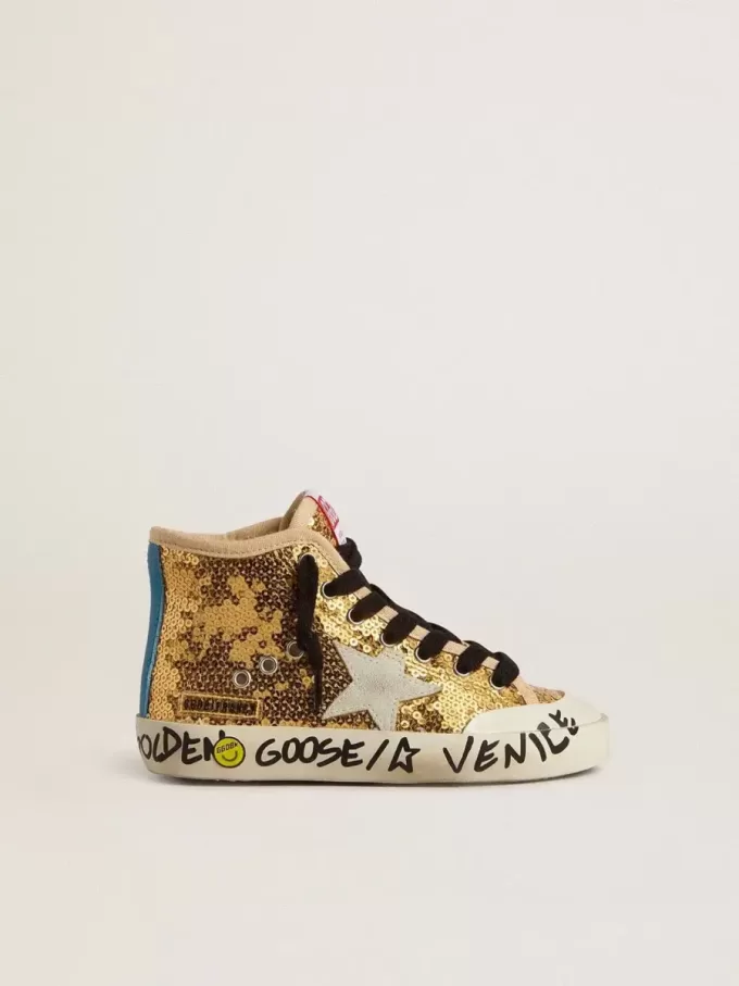 Young Francy Penstar in paillettes dorate con stella in camoscio grigio ghiaccio