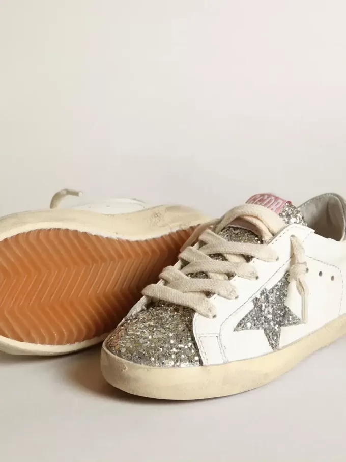 Young Super-Star con stella glitterata argento e linguetta platino Young Super-Star con stella glitterata argento e linguetta platino