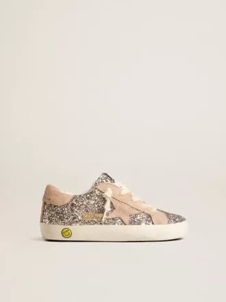 Young Super-Star glitterata con stella in pelle scamosciata e linguetta sul tallone