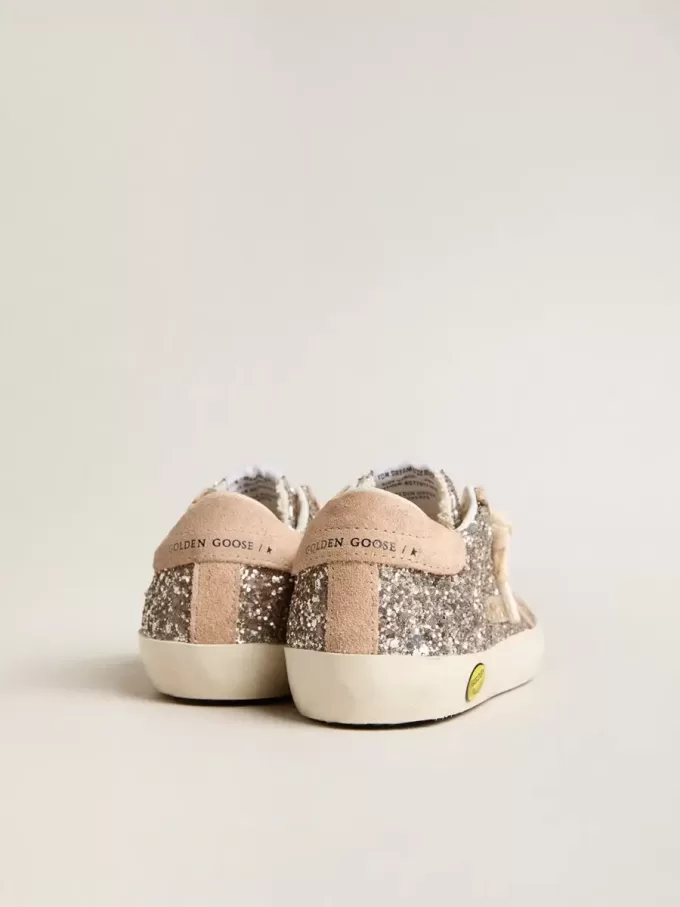 Young Super-Star glitterata con stella in pelle scamosciata e linguetta sul tallone